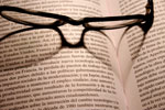 glasses-on-book-excerpt